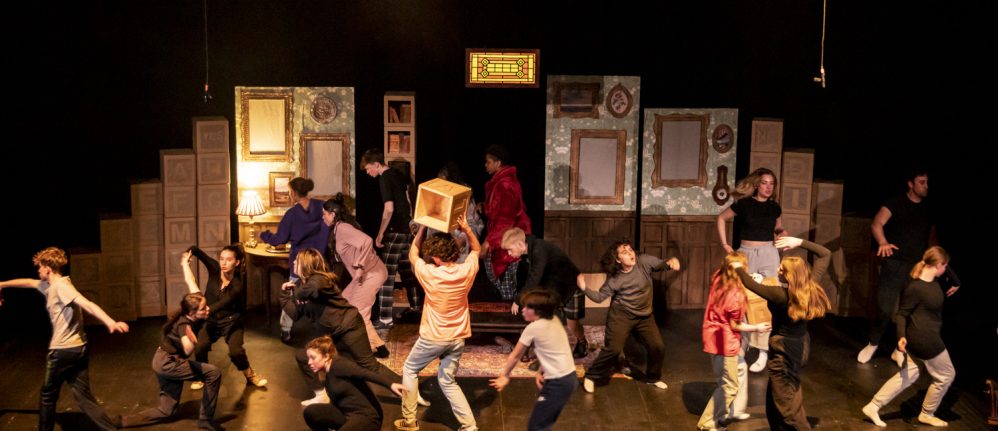 An image of young people on a theatre stage